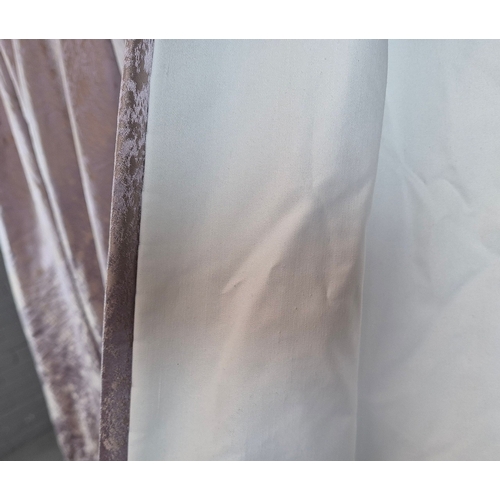 341 - CURTAINS, A PAIR. lilac patterned fabric, each curtain 175cm w gaythered by 253 cm d.