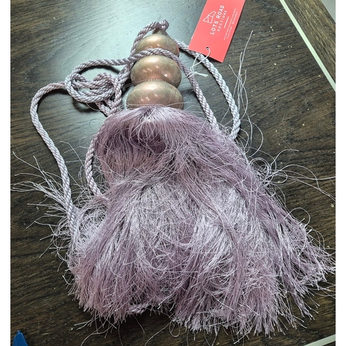 341 - CURTAINS, A PAIR. lilac patterned fabric, each curtain 175cm w gaythered by 253 cm d.