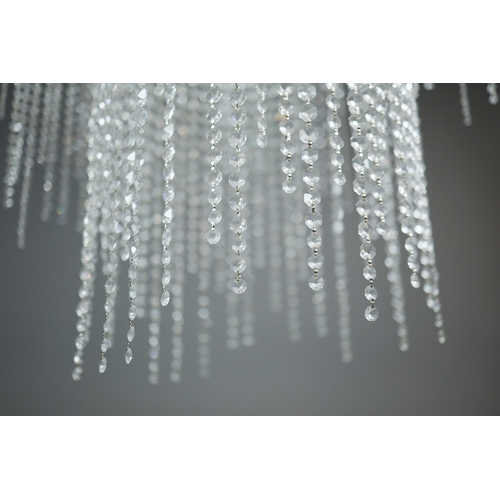 342 - CHANDELIER. polished metal frame with drops hiding 2 tiered lighting.