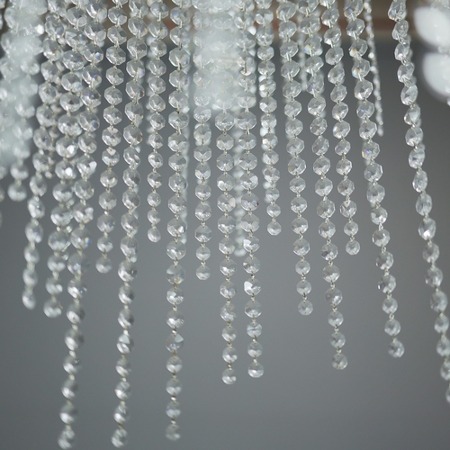 342 - CHANDELIER. polished metal frame with drops hiding 2 tiered lighting.