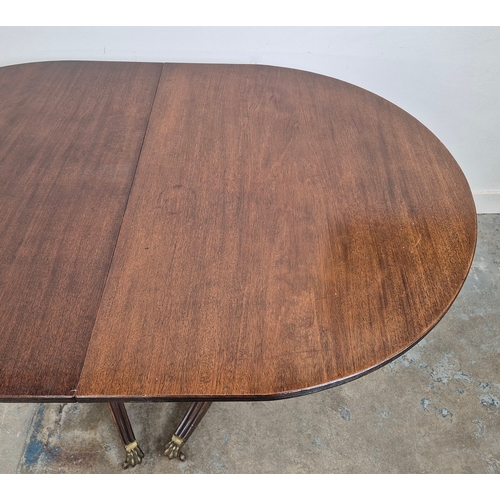 346 - DINING TABLE, REGENCY STYLE. mahogany, with two pedestals each with tripod supports, with two leaves... 