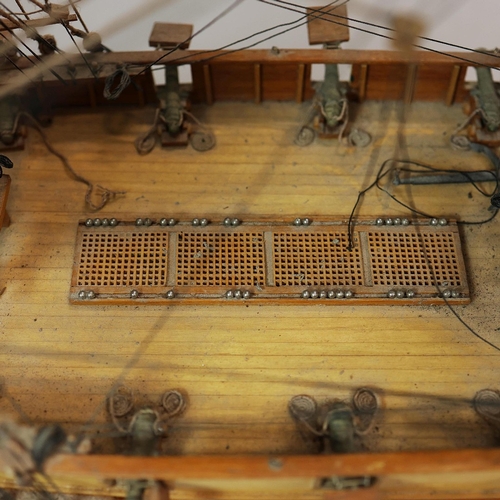 349 - MODEL OF A SQUARE RIGGED SHIP. on a small stand, plaque reads 