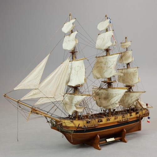 349 - MODEL OF A SQUARE RIGGED SHIP. on a small stand, plaque reads 