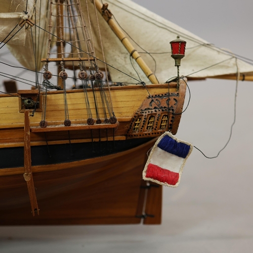 349 - MODEL OF A SQUARE RIGGED SHIP. on a small stand, plaque reads 