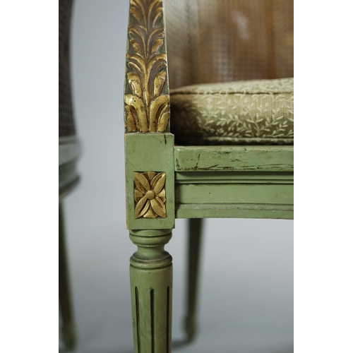 350 - DOUBLE CANED TUB CHAIRS, A PAIR. early 20th century French with green painted show frames and carved... 