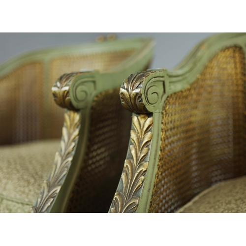 350 - DOUBLE CANED TUB CHAIRS, A PAIR. early 20th century French with green painted show frames and carved... 