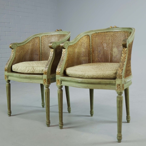 350 - DOUBLE CANED TUB CHAIRS, A PAIR. early 20th century French with green painted show frames and carved... 