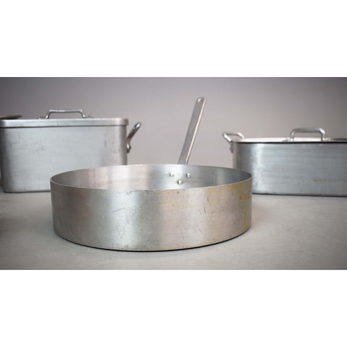 354 - A COLLECTION OF FIVE KITCHEN FISH POACHERS AND PANS. (5). comprising an aluminium turbot poacher and... 