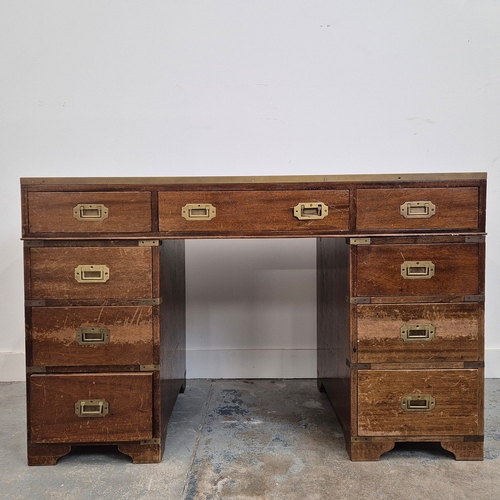 355 - MILITARY/CAMPAIGN PEDESTAL DESK. reproduction mahogany, of nine drawers with recessed brass handles,... 