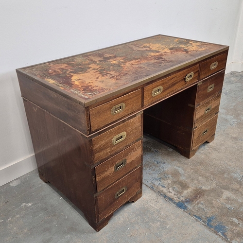 355 - MILITARY/CAMPAIGN PEDESTAL DESK. reproduction mahogany, of nine drawers with recessed brass handles,... 