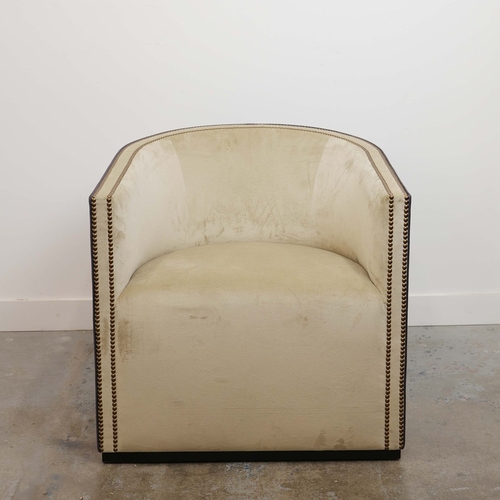 356 - ARMCHAIR, WITH A CURVED BACK. and studded detail, with a contrast back 76cm w x 80cm t.