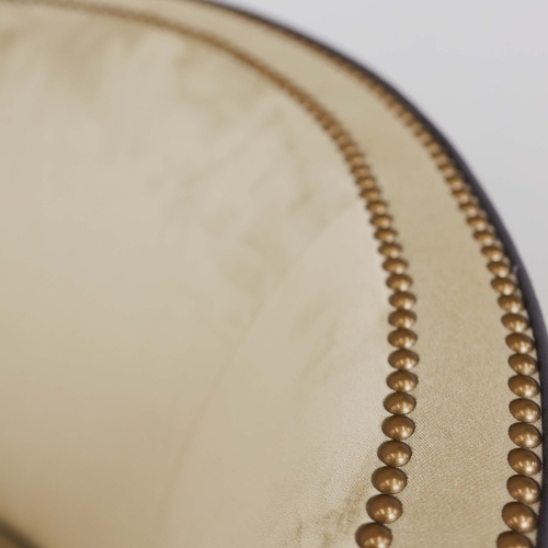 356 - ARMCHAIR, WITH A CURVED BACK. and studded detail, with a contrast back 76cm w x 80cm t.
