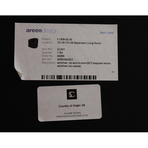 356 - ARMCHAIR, WITH A CURVED BACK. and studded detail, with a contrast back 76cm w x 80cm t.