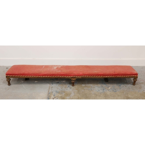 358 - 19TH CENTURY FRENCH BEECHWOOD HEARTH STOOL. long and low in crimson damask with six decoratively car... 