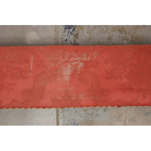 358 - 19TH CENTURY FRENCH BEECHWOOD HEARTH STOOL. long and low in crimson damask with six decoratively car... 