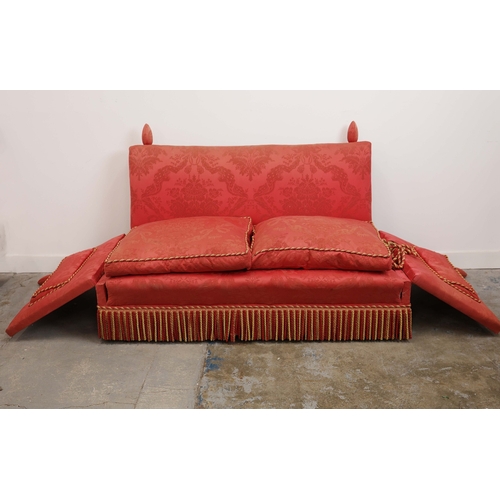 359 - KNOLE SOFA. with drop ends in crimson damask, with bullion fringe 88cm t x 158cm w x 86cm d.