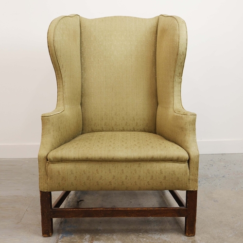 360 - GEORGE III ELM WING ARMCHAIR. Circa 1800, in green patterned upholstery 83cmw x 123cm t.