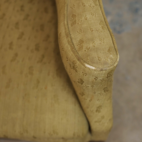 360 - GEORGE III ELM WING ARMCHAIR. Circa 1800, in green patterned upholstery 83cmw x 123cm t.