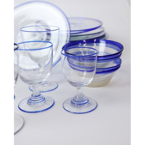 A LARGE COLLECTION OF BLUE RIMMED GLASSWARE (QTY). to include plates ...