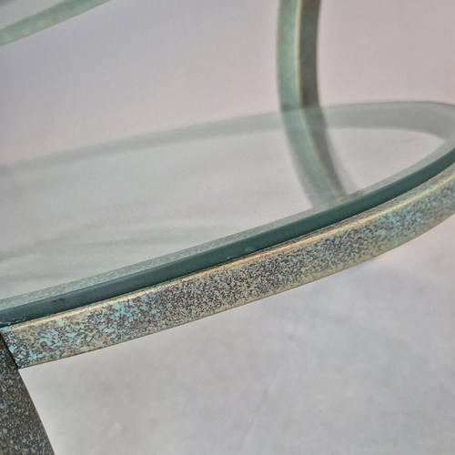695 - PIERRE VANDAL COFFEE TABLE. the oval glass top on a verdigris base 80cm w x 46cm d x 136cm w.