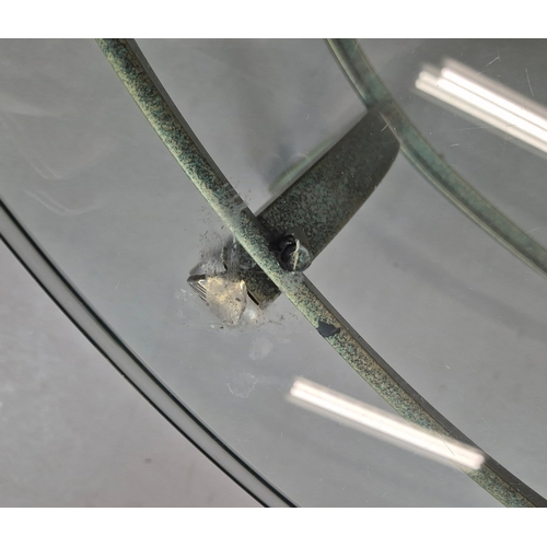 695 - PIERRE VANDAL COFFEE TABLE. the oval glass top on a verdigris base 80cm w x 46cm d x 136cm w.