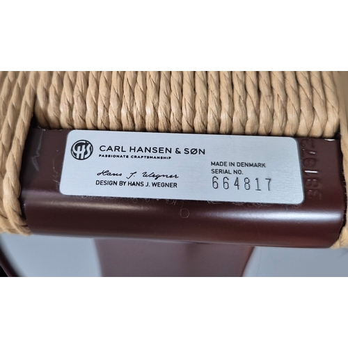 704 - CARL HANSEN & SON WISHBONE CHAIR. by Hans J Wegner, 76cm H approx.