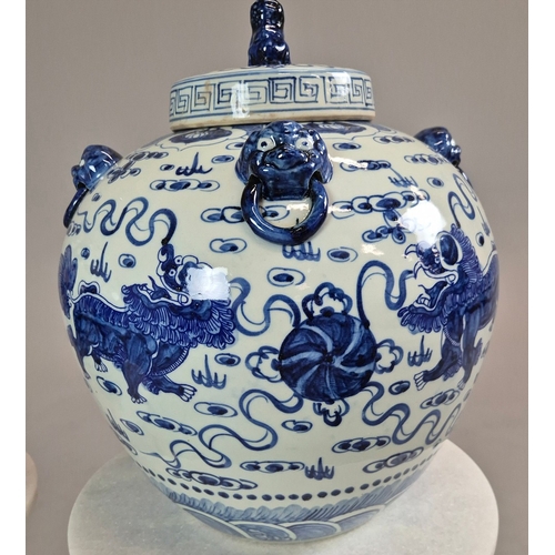 721 - PAIR OF BLUE AND WHITE CHINESE CERAMIC LIDDED JARS. 42cm H x 34cm W.