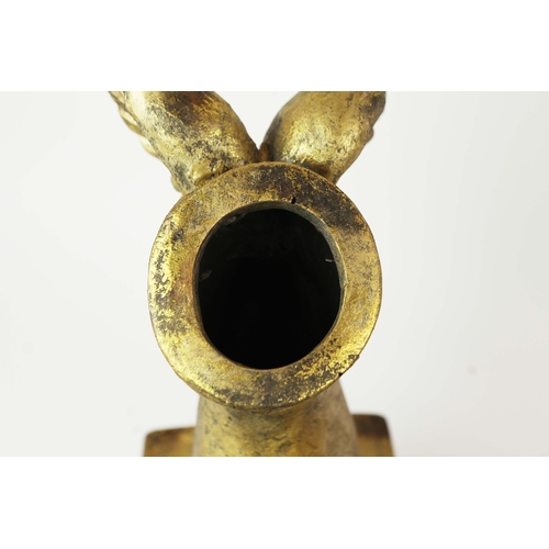 738 - PAIR OF GILT WINGED FEET PLANTERS. In resin
35cm H x 17cm W x 24cm D.