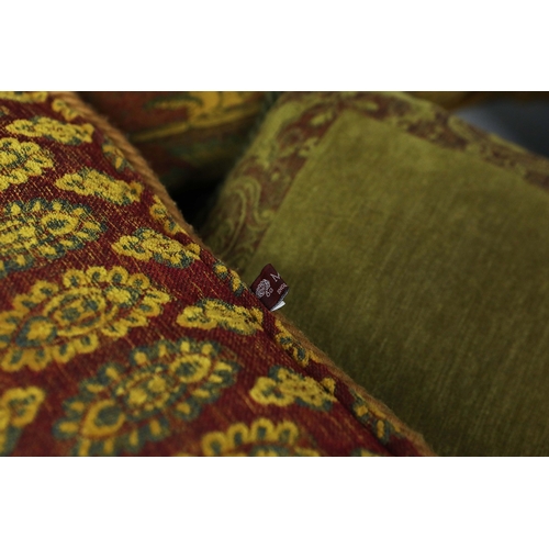 937 - A COLLECTION OF FIVE MULBURRY CUSHIONS. (5). with tasselled edges. 61cm x 41cm.