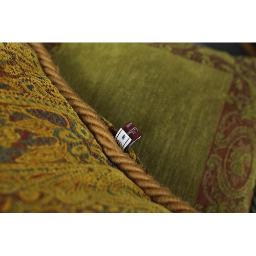 937 - A COLLECTION OF FIVE MULBURRY CUSHIONS. (5). with tasselled edges. 61cm x 41cm.