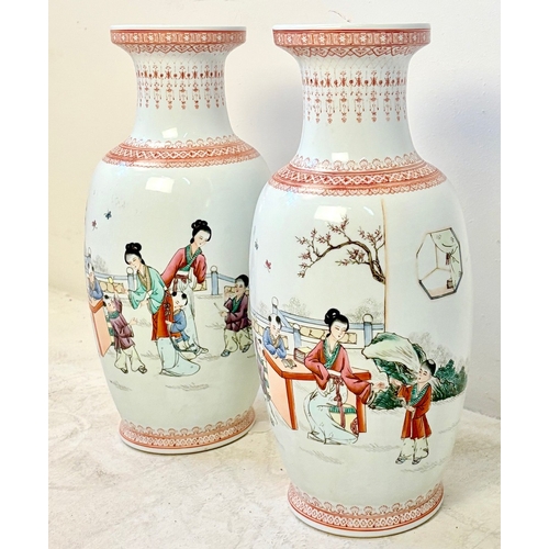 10 - PAIR OF CHINESE CERAMIC VASES WITH DECORATIVE SCENES. 46cm H x 19cm W.