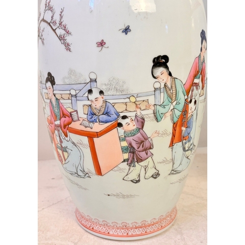 10 - PAIR OF CHINESE CERAMIC VASES WITH DECORATIVE SCENES. 46cm H x 19cm W.