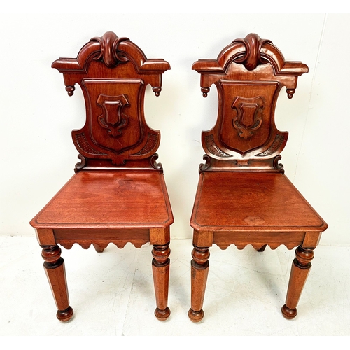 14 - PAIR OF VICTORIAN GOTHIC REVIVAL MAHOGANY HALL CHAIRS. 90cm H x 42cm W x 38cm D.
