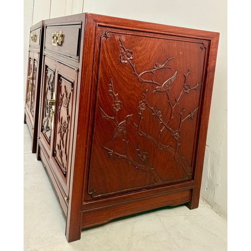 15 - PAIR OF CHINESE TEAK BEDSIDE CABINETS WITH CARVED PANEL DOORS BY GEORGE ZEE. 60cm H x 56cm W x 46cm ... 