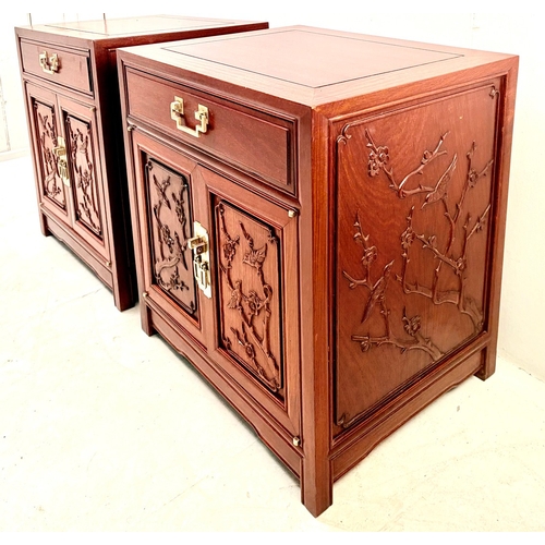 15 - PAIR OF CHINESE TEAK BEDSIDE CABINETS WITH CARVED PANEL DOORS BY GEORGE ZEE. 60cm H x 56cm W x 46cm ... 
