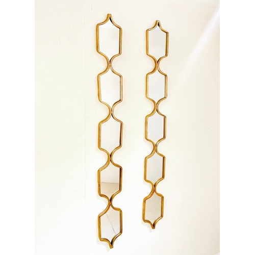 26 - PAIR OF CONTEMPORARY ACENT MIRRORS. in gilt metal frames, 144cm H x 15cm W.