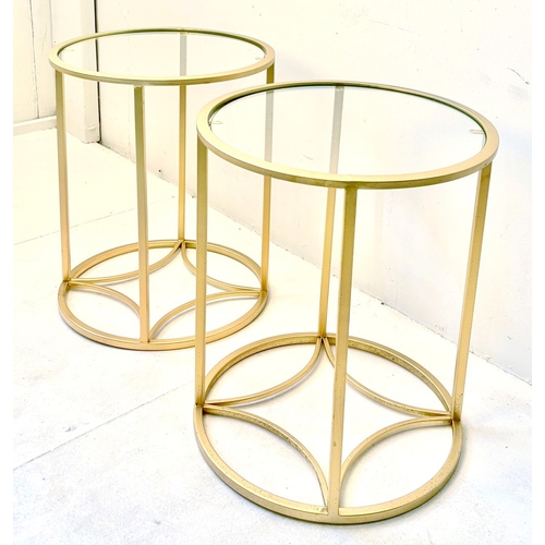 28 - PAIR OF OCCASIONAL TABLES. in gilt metal with circular glass tops, 47cm H x 38cm W.