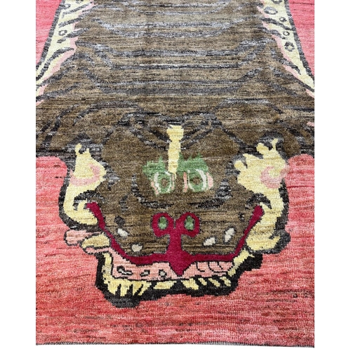 288 - TIBETAN TIGER CARPET. 284cm x 198cm.