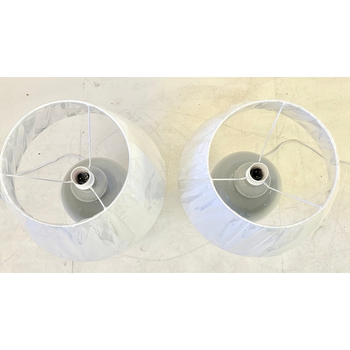 31 - PAIR OF GREY CERAMIC TABLE LAMPS WITH WHITE SHADES. 55cm H x 35cmW.