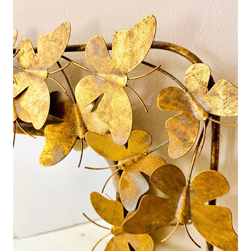 33 - WALL MIRROR WITH GILT METAL BUTTERFLY FRAME. 11cm H x 80cm W.