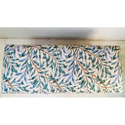 37 - LONG STOOL WITH BOTANICAL DESIGN UPHOLSTERY ON REEDED SUPPORTS. 47cm H x 100cm W x 40cm D.