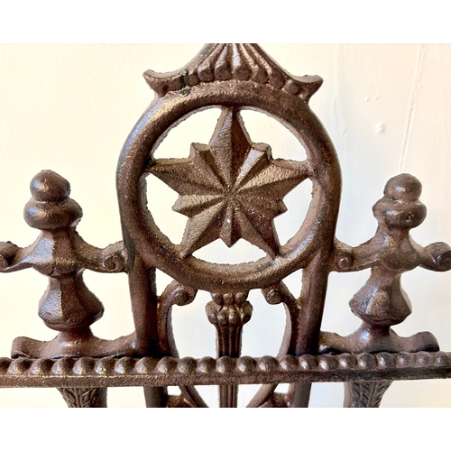 4 - CAST IRON UMBRELLA STAND. 60cm H x 43cm W x 20cm D.