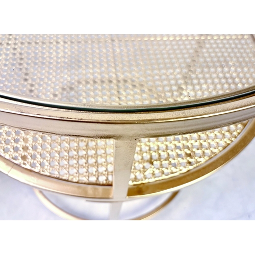 40 - PAIR OF CONTEMPORARY DESIGN GILT METAL OCCASIONAL TABLES WITH CIRCULAR GLASS TOPS. 61cm H x 58cm W.