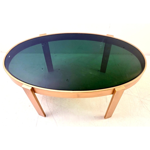 41 - LOW TABLE WITH A GILT METAL FRAME AND SMOKED GLASS TOP. 46cm H x 99cm W x 60cm D.