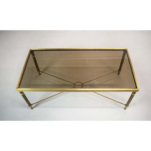 42 - BRASS LOW TABLE. tinted glass top, 44cm H x 110cm W x 55cm D.