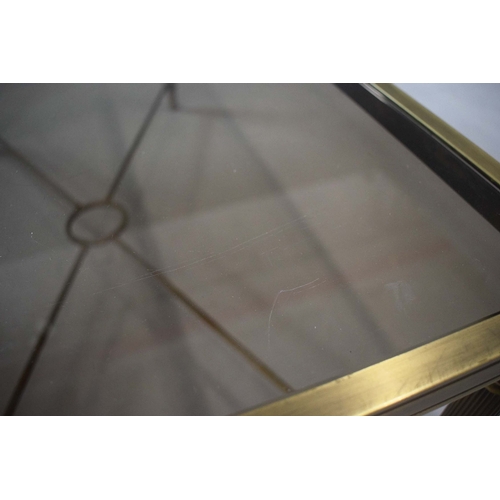 42 - BRASS LOW TABLE. tinted glass top, 44cm H x 110cm W x 55cm D.