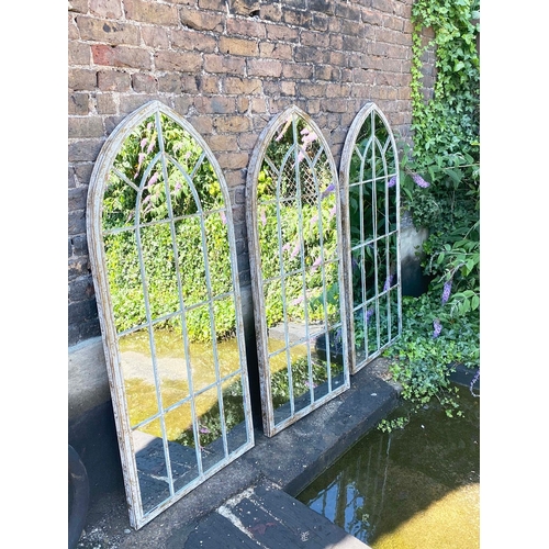 56 - SET OF THREE ARCHITECTURAL GARDEN MIRRORS WITH ARCHED METAL FRAMES. 160cm H x 67cm.