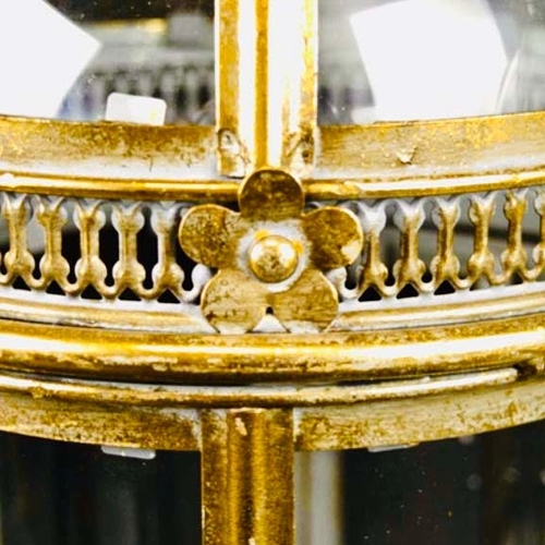 61 - SET OF FOUR REGENCY STYLE GILT METAL AND GLASS LANTERNS. 46cm H x 19cm W.