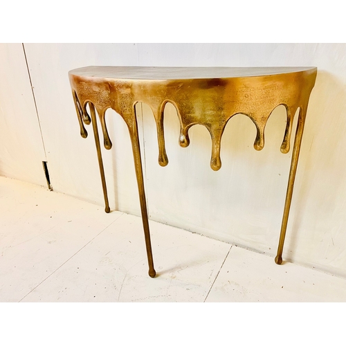 71 - GILT METAL CONSOLE TABLE WITH DRIPPING DESIGN. 76cm H x 90cm W x 34cm D.