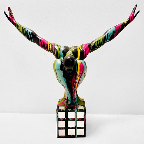72 - CONTEMPORARY DIVER SCULPTURE IN PAINT SPLATTERED FINISH. 81cm H x 82cm W x 28cm D.